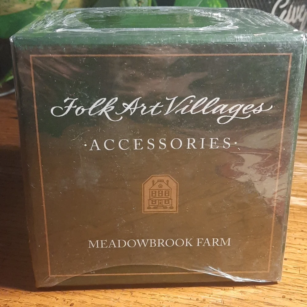 New Lang and Wise Meadowbrook Farm Man and woman planting
